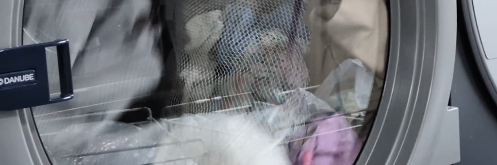 Machine industrielle pressing écologique L'Atelier du Linge Lyon - Entretien textile éco-responsable, recyclage eau 80%